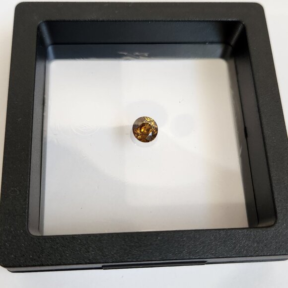 Sphene 7.18mm x 6.88mm x 4.30mm Oval 1.47ct Loose Gemstone - Picture 15 of 16